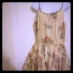 Matty M Carousel Print & Handkerchief laced dress